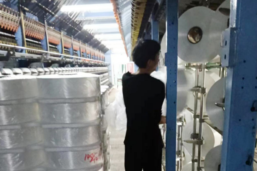 Area di sospensione del filo di produzione DTY