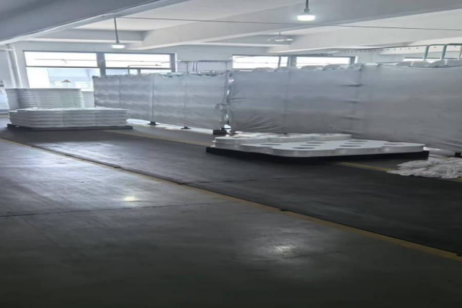 Area di posizionamento delle materie prime per la produzione di tessuto grigio